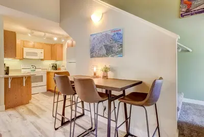 a kitchen with a table and chairs in a room at Tahoe Snowbird Retreat in Stateline