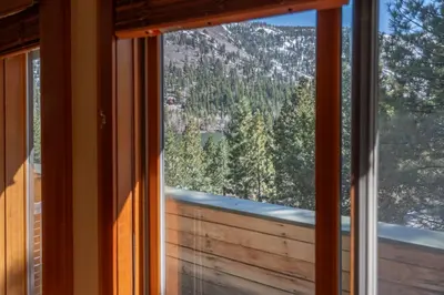 a window with a view of a mountain at Rr-carson_view1 Strap18-005 in June Lake