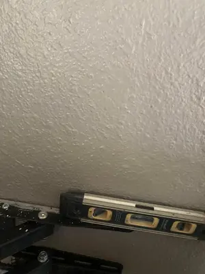 a laptop computer sitting on top of a ceiling at Valley Motel in Atwater