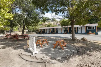 a group of picnic tables in a park at The Moro | Sequoia Motel RM3 in Three Rivers