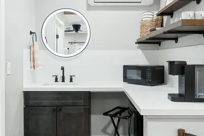 a white kitchen with a sink and a microwave at The Congress Sequoia Motel RM6 in Three Rivers