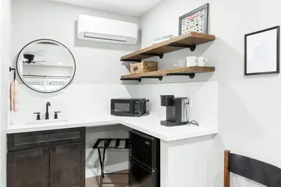 a kitchen with a sink and a microwave at The Heather Sequoia Motel RM 4 in Three Rivers