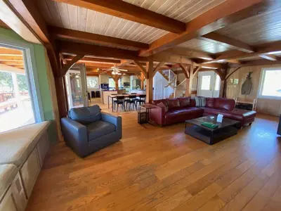a living room with a couch and a table at Peaceful & secluded, yet close to town. in Mariposa