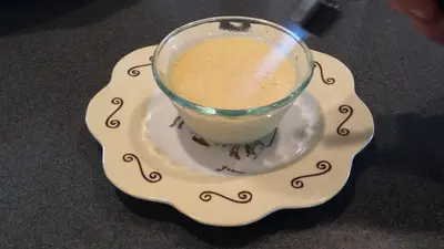 a drink on a plate with a glass on it at Yosemite Plaisance Bed & Breakfast in Mariposa