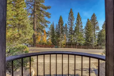 a view from a balcony of a basketball court with trees at Studio with Incredible Location in Tahoe City in Tahoe City