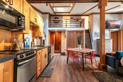 a kitchen with a table and a dining room at Studio with Incredible Location in Tahoe City in Tahoe City