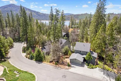 an aerial view of a house with a driveway at Wishing Well Cabin in Bass Lake