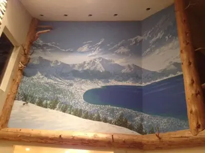 a mural on the wall of a room with water and mountains at Big Luxury South Lake Tahoe Home in South Lake Tahoe