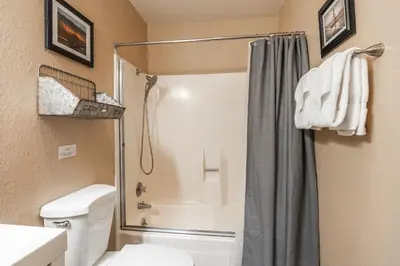 a bathroom with a shower and a toilet at Summit Forester #47 BLDG.2 Bedrm / 2 bath Ski in Ski Out! Steps to Chair 15 at Little Eagle Lodge! in Mammoth Lakes