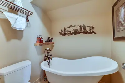 a bathroom with a toilet and a sink at Mammoth Lakes Condo - Steps to Ski Lift! in Mammoth Lakes