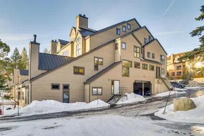 a large house with a gambrel roof at Mammoth Lakes Condo - Steps to Ski Lift! in Mammoth Lakes