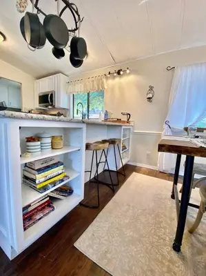 a kitchen with a counter and a counter top at B-B Ranch Cottage~Heart of Gold Country~*HOT TUB* in Pilot Hill