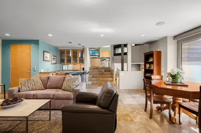 a living room with a couch and a table at Mountain Zen Tahoe Luxury Property Incline Village Lakeview in Incline Village