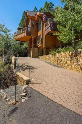 a house with a brick driveway in front of it at Mountain Zen Tahoe Luxury Property Incline Village Lakeview in Incline Village