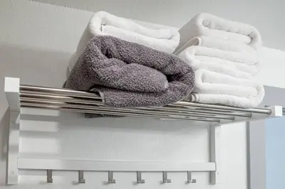 a towel rack with towels on top of it at Luxury Villa in Sierra Mountains in Alta