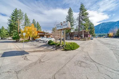 a sign on the side of a road in a town at Moose and Maple Lodge in South Lake Tahoe
