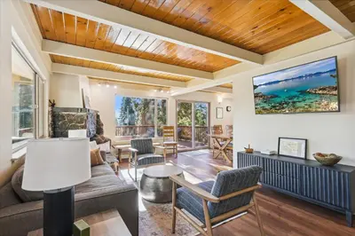 a living room with a couch and chairs at Cedar Chalet by Tahoe Getaways - Stunning 3BR with Fireplace & Pet Friendly in Tahoe Vista