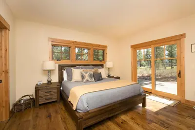 a bedroom with a bed and a window at Caleb's Getaway by Tahoe Getaways at Old Greenwood- 3BR w Bonus Room, Pets Welcome & Ski Shuttle! in Truckee