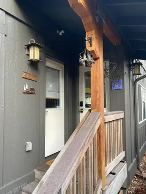 a front porch of a house with a wooden door at Lake Tahoe Luxury Guest Quarters in South Lake Tahoe