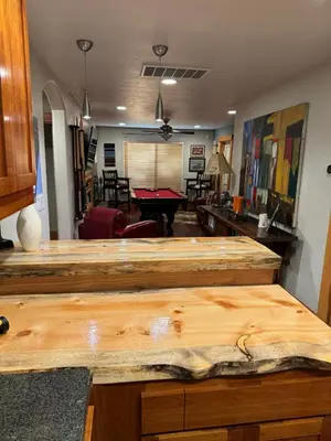 a living room with a table and a pool table at Lake Tahoe Luxury Guest Quarters in South Lake Tahoe