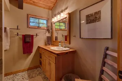 a bathroom with a sink and a mirror at Lazy Bear in Tahoe City