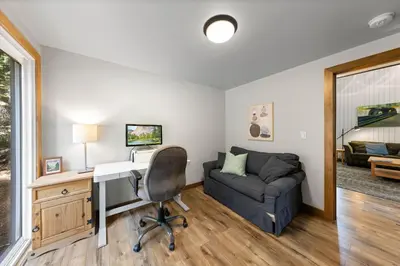 an office with a desk and a couch and a desk at Ellis Peak Retreat - Hot Tub, Wood Fireplace, Close to Tahoe City & Dining in Tahoe City