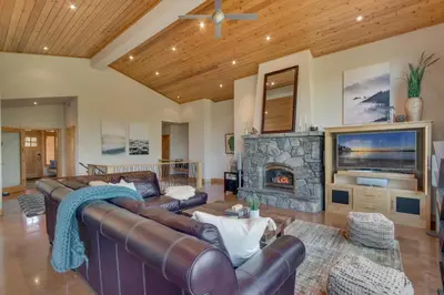 a living room with a couch and a fireplace at Pinnacle Views at Tahoe Donner - 4BR, Hot Tub in Truckee