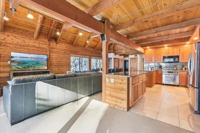 a kitchen with wooden walls and wooden ceiling at Ponderosa Pines - Custom 3 BR - Pet Friendly Private Hot Tub - Ski Shuttle in Truckee
