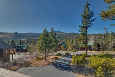 a view of a driveway with trees and a house at Stockholm - Beautiful Views in Tahoe Donner - Private Hot Tub - Pet Friendly in Truckee