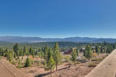 an aerial view of a forest of trees at Grand Vista Lodge by Tahoe Getaways - 5 BR with Stunning Views, Pool Table, Private Hot Tub & HOA Pool! in Truckee