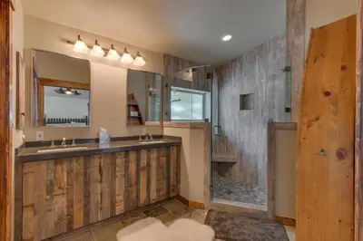 a bathroom with a sink and a shower at Above the Pines - Hot Tub- Pet Friendly -Gym and Pool Access in Truckee
