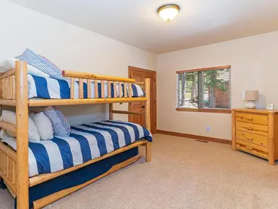a bedroom with a bunk bed and a window at Amazing mountain setting in Incline Village