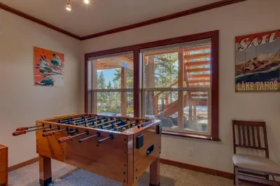 a game room with a table with wine bottles at Lake Haven at Dollar Point - Spacious 4 BR w Lake Views, Sauna, Near Ski Resorts! in Tahoe City