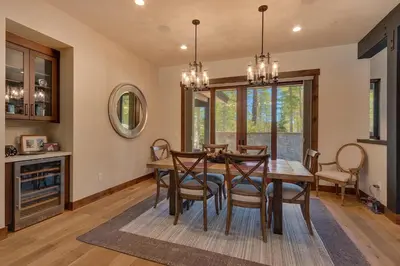 a dining room with a table and chairs at Sage Hen at Grays Crossing - Gorgeous 4BR 4BA Home w Private Hot Tub in Truckee