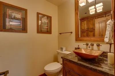 a bathroom with a sink and a toilet at Hawk's Peak at Tahoe Donner in Truckee