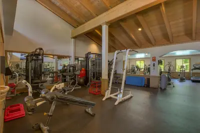 a gym with several treadmills and exercise equipment at Rocky Point # 4 - 2 BR Northstar Condo, Shuttle to Slopes, HOA Amenities! in Truckee