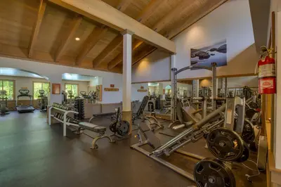 a gym with lots of equipment in a room at Silver Strike #2- Walk to Village- Ski Shuttle to Lifts in Truckee