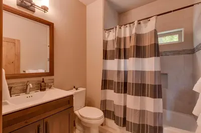a bathroom with a toilet and a sink and a shower at Skyland Jewel at Dollar Point - Luxury 3BR - Easy Winter Access in Tahoe City