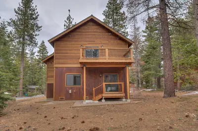 a cabin in the woods with a tree at Skyland Jewel at Dollar Point - Luxury 3BR - Easy Winter Access in Tahoe City