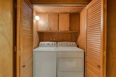 a washer and dryer in a small kitchen at View at Dollar Point - Beautiful Lake Views with Sunny Deck, Quiet Neighborhood, Near Skiing in Tahoe City