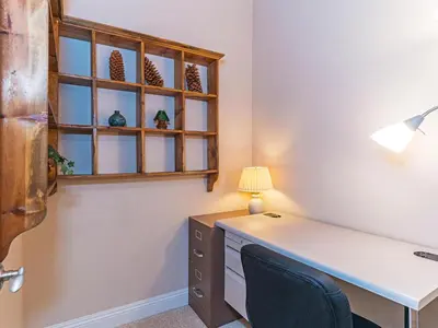a home office with a desk and a window at 223 Forest Pines short walk to bike path and the Hyatt Casino in Incline Village