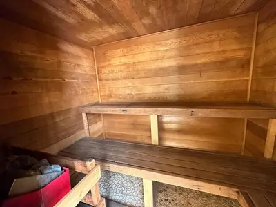 a wooden sauna with a wooden bench in it at 226 McCloud great location in Incline Village