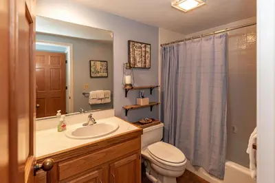 a bathroom with a sink and a toilet and a shower at 226 McCloud great location in Incline Village