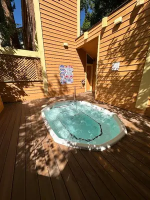 a small swimming pool on a wooden deck at 226 McCloud great location in Incline Village
