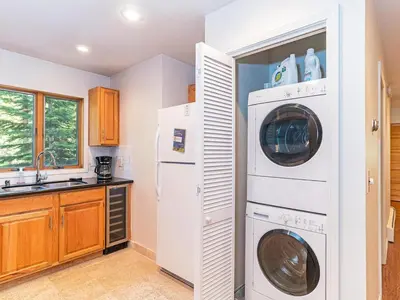 a laundry room with a washer and dryer in it at 252 McCloud Upper level unit in Incline Village