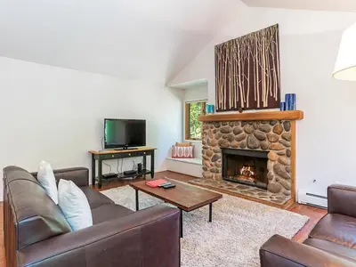 a living room with a couch and a fireplace at 252 McCloud Upper level unit in Incline Village
