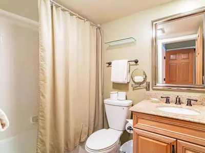 a bathroom with a toilet and a sink and a shower at 39 McCloud Incline Village in Incline Village