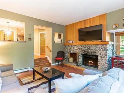 a living room with a couch and a fireplace at 39 McCloud Incline Village in Incline Village