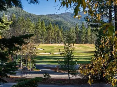 a golf course with trees and a field of grass at Incline Village Championship Golf Coarse Retreat in Incline Village