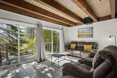 a living room with a couch and a table at Incline Village Championship Golf Coarse Retreat in Incline Village